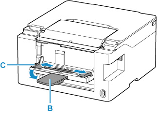 Pull out the paper support (B) and slide the left paper guide (C)