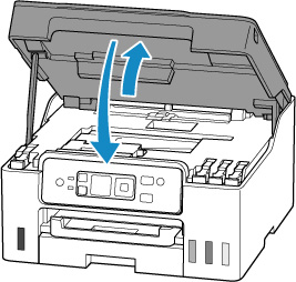Close the scanning unit / cover by lifting it up slightly and then lowering it gently