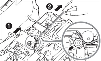 Pull the tube out while pressing the jam recovery lever in the direction of the arrow