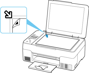 Place the sheet with the printed side facing down, lining the arrow on the sheet against the alignment mark on the scanner