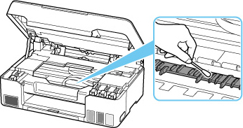 Wipe off any ink from the protrusions inside the printer using a cotton swab or the like