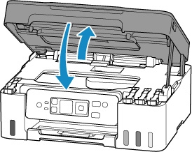 Slightly lift and gently lower the scanning unit / cover to close it