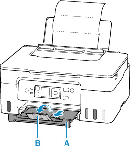 Pull out the paper output tray (A) and open the output tray extension (B)