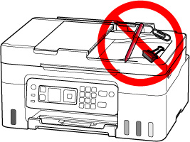 Do not place objects on the top cover of the printer