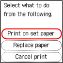 Select Print on set paper (outlined in red) and press the printer's OK button
