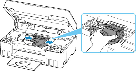 Hold the top of the print head holder and slide it slowly to the far right or left