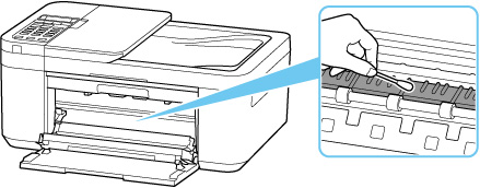 Wipe the protrusions inside the printer with a cotton swab