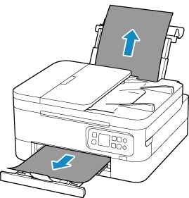 Slowly pull paper from the front or rear of the printer, whichever is easier