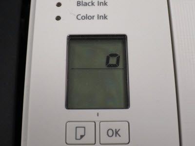 Image of printer LCD panel with alternate position of flashing zero