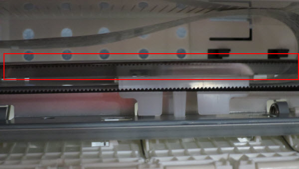 Make sure the Encoder Film (outlined in red) inside the printer is clear