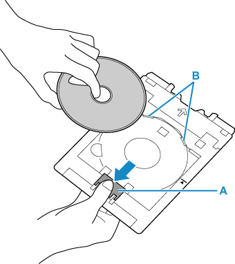 Figure: Press down on the lock (A) and take out the printable disc from the slits (B) on the multi-purpose tray