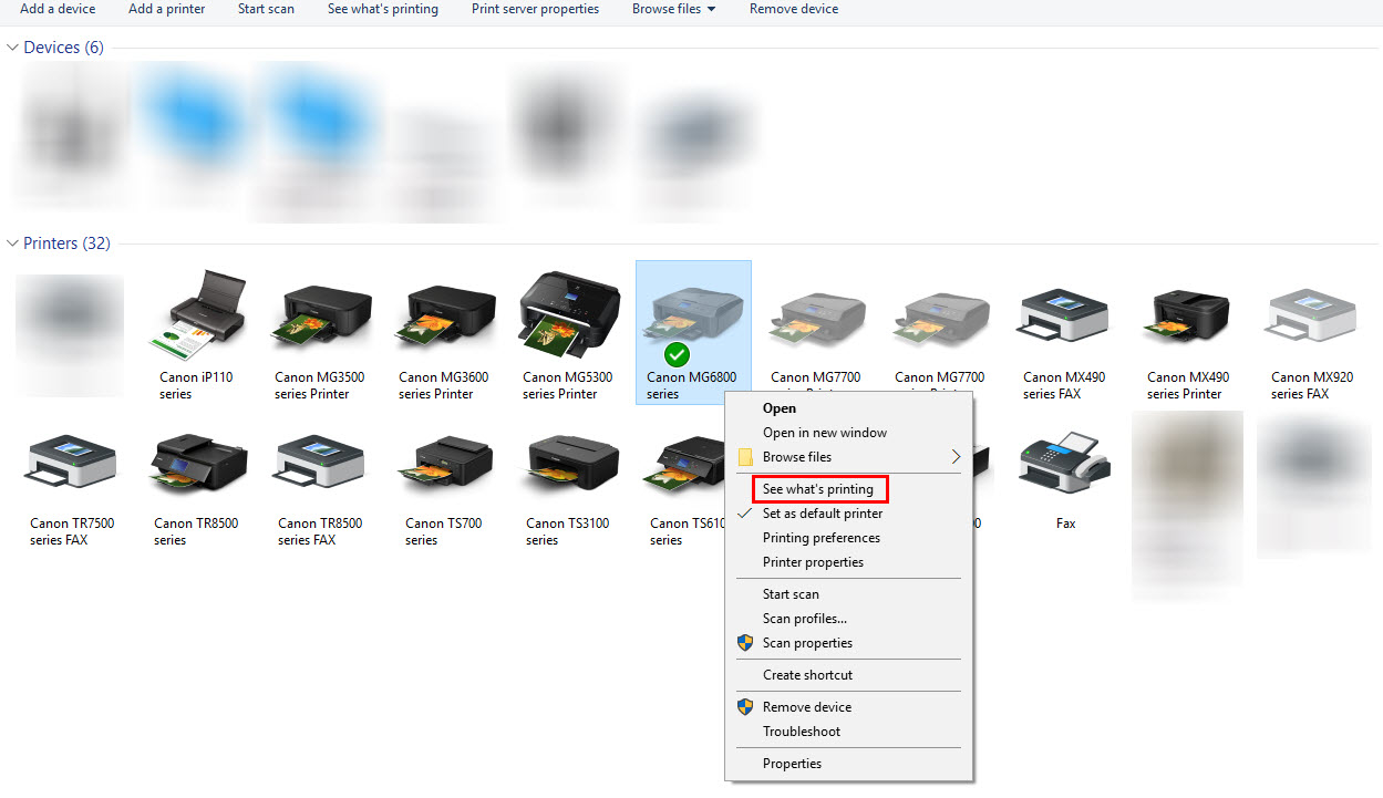 Image of Devices and Printers screen with a printer selected and see what's printing is highlighted in the dropdown menu