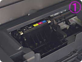 Animated image shows print head lock lever raised and pulled slightly forward, then lifted out