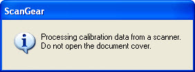 Screen: Processing calibration data from a scanner. Do not open the document cover.